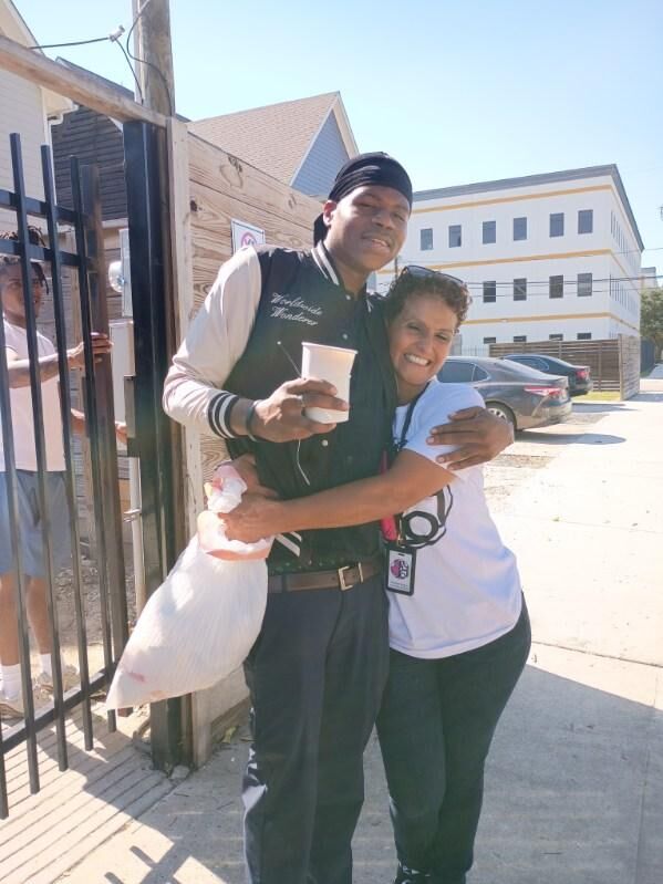A warm embrace during community outreach
